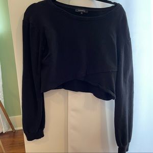 Black long sleeve crop top with asymmetrical design